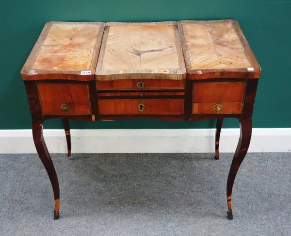 An 18th century French inlaid kingwood lift-top dressing table on cabriole supports, 79cm wide x 73cm high x 46cm deep.