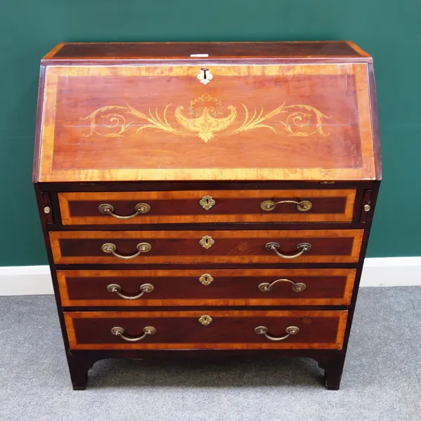 A George III marquetry inlaid mahogany bureau, the fitted interior over four long graduated drawers, on bracket feet, 94cm wide x 108cm high x 47cm de