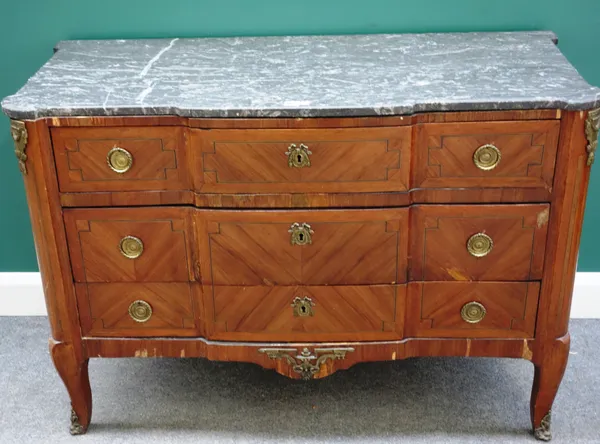 A 19th century French gilt metal mounted kingwood commode, the shaped marble top over three long drawers, on cabriole supports, 127cm wide x 88cm high