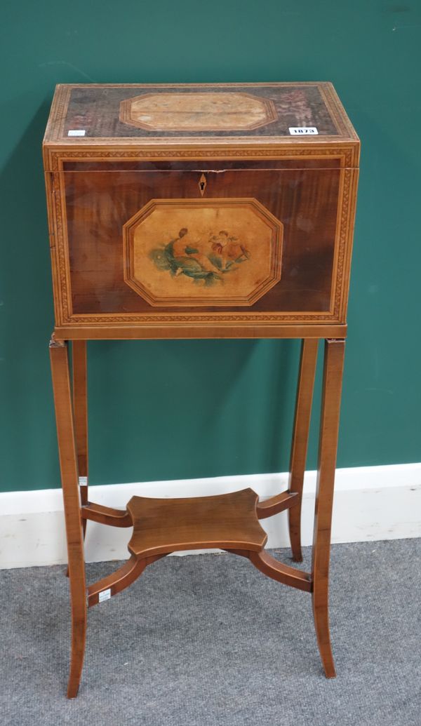 A George III marquetry inlaid harewood rectangular box on four splayed supports (a.f), the box 36cm wide x 25cm high x 23cm deep.