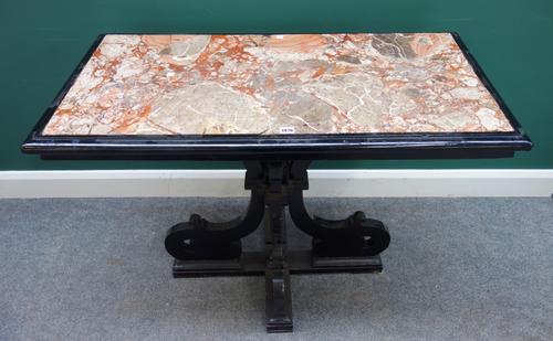 An Italian 18th century and later centre table, the rectangular marble top on an ebonised base, with four shaped supports united by stretcher, 107cm w