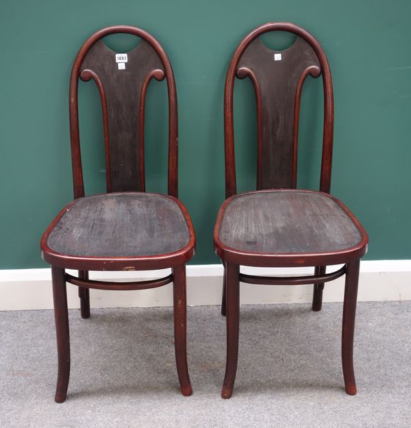 Thonet; a set of six early 20th century stained beech dining chairs, on splayed supports, (6).