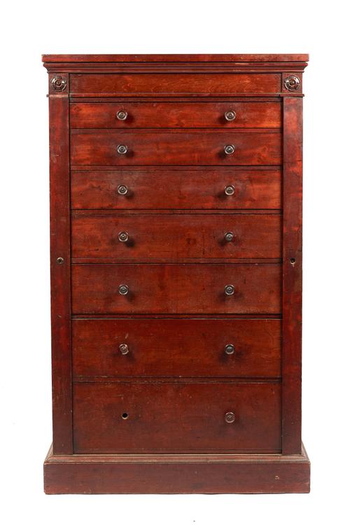James Winter, 101 Wardour St, Soho, London; a 19th century mahogany Wellington chest with seven long graduated drawers inclosed by locking bar on plin