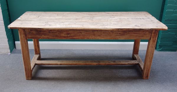 An early 19th century elm plank top kitchen table, with single frieze drawer, on canted block supports, 178cm long x 73cm wide x 75cm high.