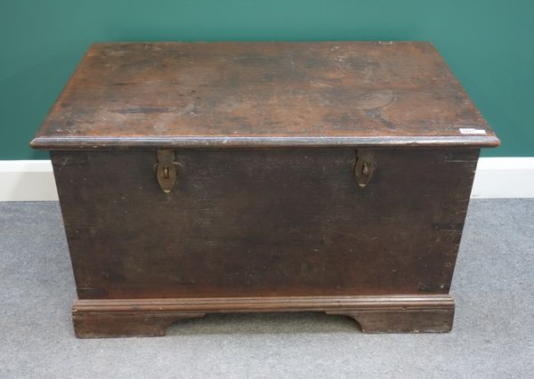 A 19th century Anglo Indian teak travelling trunk, with fitted carved sandalwood interior, 98cm wide x 57cm high x 60cm deep.