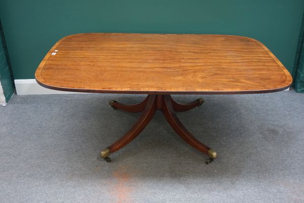 A George III rosewood banded mahogany snap-top breakfast table, on four downswept supports, reduced in height, 104cm wide x 152cm long x 61cm high.