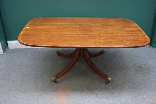A George III rosewood banded mahogany snap-top breakfast table, on four downswept supports, reduced in height, 104cm wide x 152cm long x 61cm high.