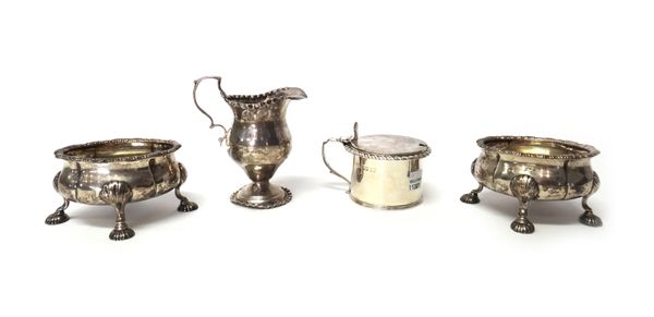 Silver, comprising; a pair of George II silver salts, of shaped oval form, with gadrooned borders, raised on four shell capped feet, London, probably