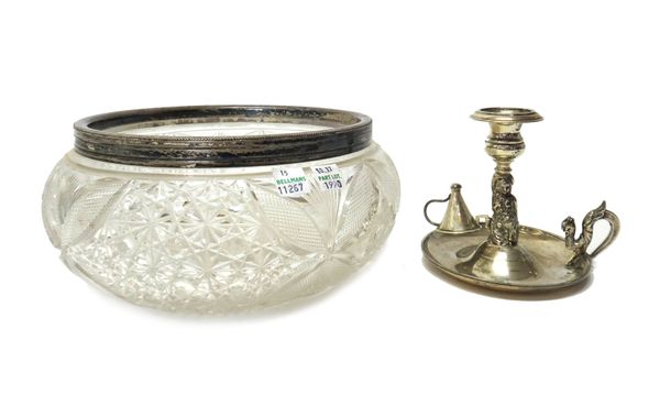 A European silver chamberstick, the stem modelled as a kneeling female bearing fruit, with a detachable snuffing cone together with a silver cut glass