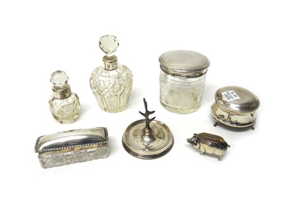 Silver and silver mounted wares, comprising; a pin cushion, formed as a pig, Birmingham 1907, two faceted glass scent bottles, two glass containers, h