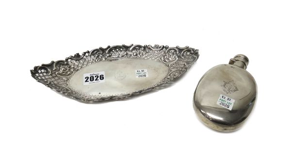 Silver, comprising; a Victorian shaped oval dish, decorated with a cast and pierced border, crest engraved, length 23.5cm, Sheffield 1895 and a Victor