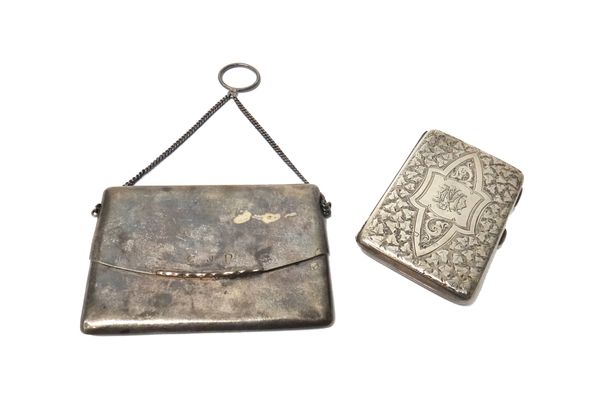 A silver rectangular visiting card case, having a sprung flap, fitted with a carrying chain and a suspension ring. Chester 1912 and a silver rectangul