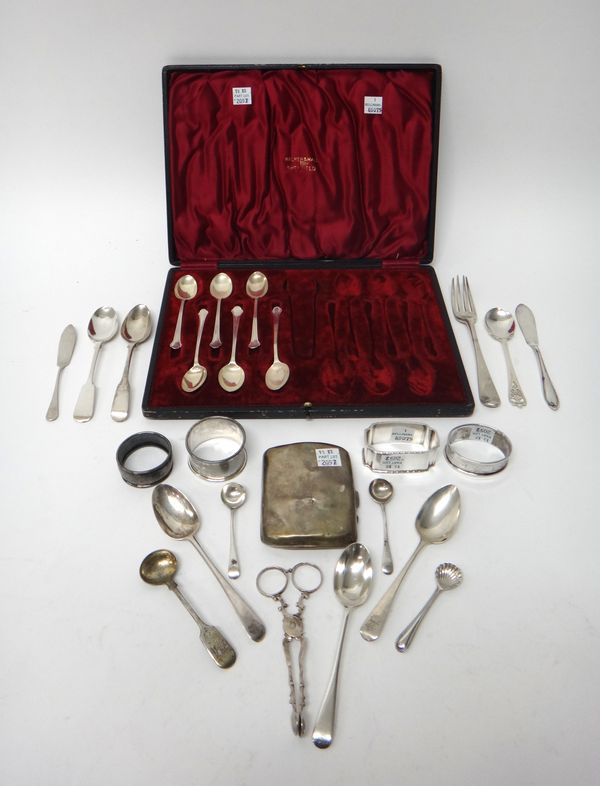 Silver, comprising; four napkin rings, a cigarette case, a pair of sugar nips, circa 1800, two butter knives, a fork, four salt spoons, a preserve spo