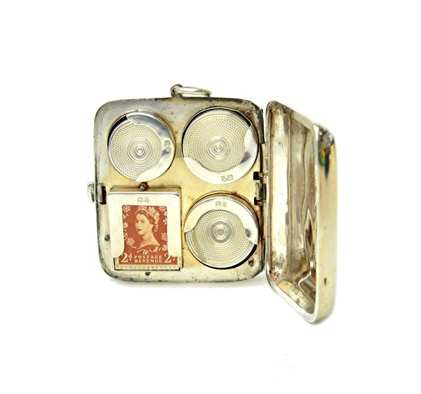 A silver triple coin compartment cum single stamp compartment case, of rectangular form, the front with an applied shield shaped motif, Birmingham 190