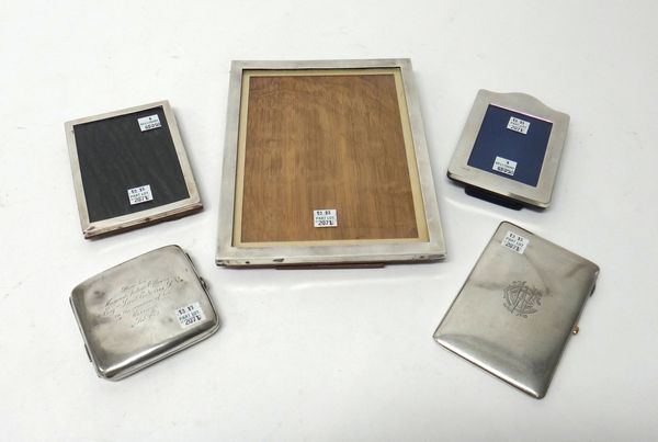 Silver and silver mounted wares, comprising; a rectangular photograph frame, Birmingham 1926, size of frame 22.5cm x 17.5cm, two further photograph fr