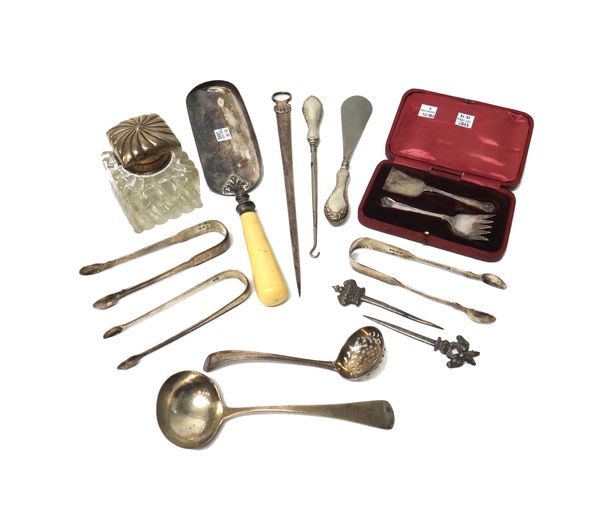 Silver and silver mounted wares, comprising; three pairs of sugar tongs, a sugar sifting spoon, a skewer with a ring and scallop handle, London 1781,