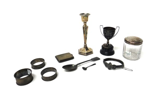 Silver and silver mounted wares, comprising; a dressing table jar and cover, London 1917, a hexagonal candlestick, a small twin handled trophy cup, wi