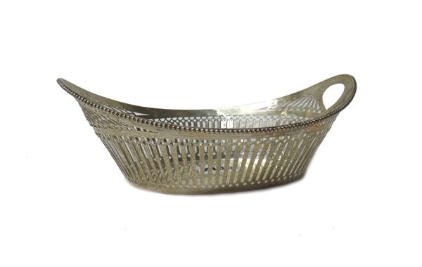 A Dutch silver twin handled basket, of oval form, with pierced decoration within a beaded rim, length 23 cm. weight 206 gms,