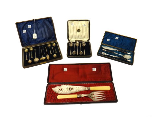 A silver ten piece flatware set, comprising; a butter knife, a preserve spoon, a pair of sugar tongs, a sugar sifting spoon and a set of six teaspoons