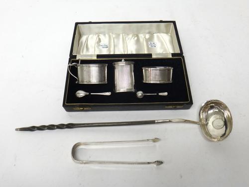 Silver, comprising; a three piece condiment set, of oval form, with engine turned decoration, Birmingham 1947, with two silver later condiment spoons,