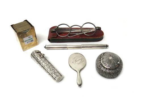 A silver rectangular case to hold two packs of playing cards, the exterior plain, Birmingham 1899, a Sterling silver cased pen, detailed The Mascot vi