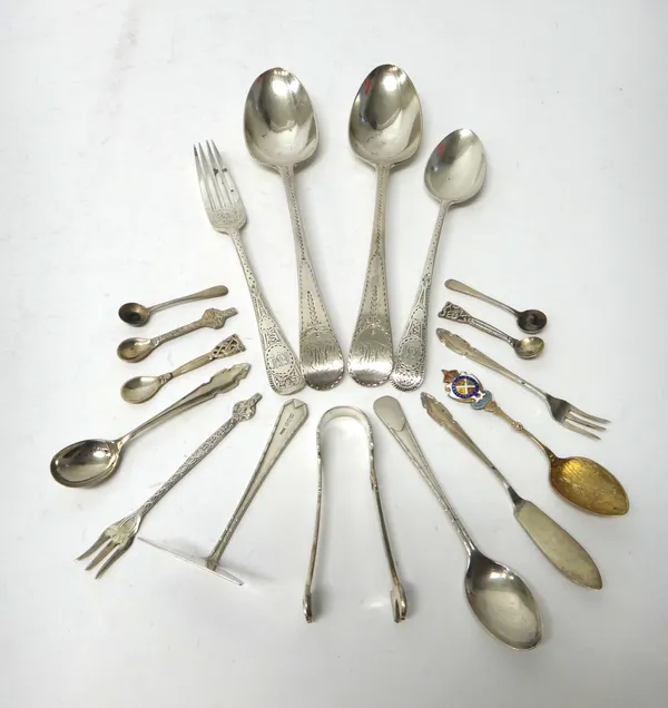 Silver flatware, comprising; a pair of George III tablespoons, having bright cut engraved decoration, London 1785, a baby's pusher and spoon, London 1