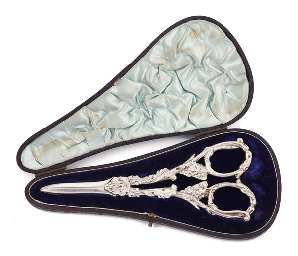 A pair of Victorian silver grape scissors, the cast handles decorated with fruiting vine, London 1893, weight 122 gms, with a fitted case.  Illustrate