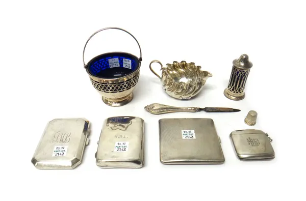 Silver and silver mounted wares, comprising; three cigarette cases, a Sterling handled nail file, a milk jug, with spiral fluted decoration, Sheffield