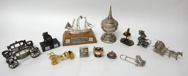 A group of silver, foreign and ornamental wears, comprising; a model of HMS Victory, mounted to an oak base, an Eastern vase and cover, a filigree min