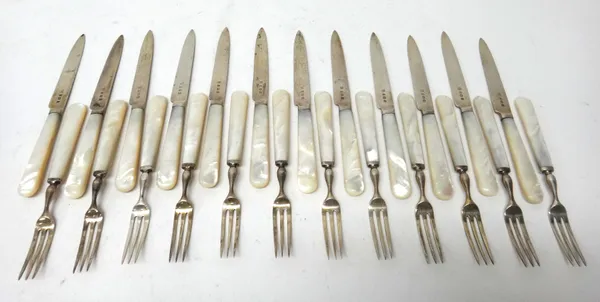 Twelve pairs of dessert or fruit knives and forks, having silver blades and prongs and with mother of pearl handles, Birmingham 1937.
