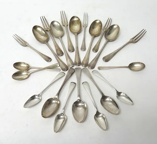 A silver rat tail pattern part table service, comprising; five tablespoons, three three pronged table forks, three teaspoons and two three pronged des