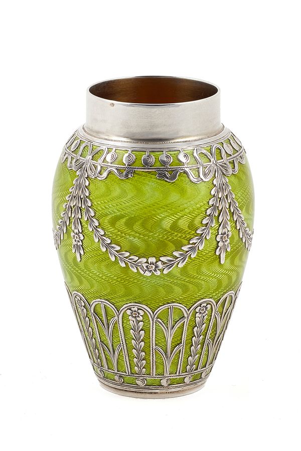 A pale green enamelled vase, of baluster form, with translucent guilloche lime green enamelled decoration and with applied floral and pendant foliate