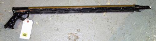 Flash Gordon: An original prop speargun,Universal Pictures, 1980,resin/fibreglass prop speargun painted black and gold, used by one of Vultan's hawkme