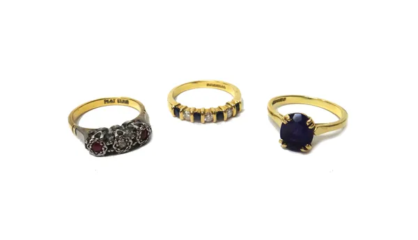 An 18ct gold, sapphire and diamond seven stone half hoop ring, mounted with four circular cut sapphires alternating with three circular cut diamonds,