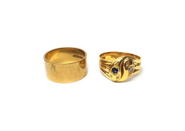An 18ct gold, sapphire and diamond ring, designed as two conjoined serpent's heads, both with diamond set eyes, London probably 1899, ring size T, wei
