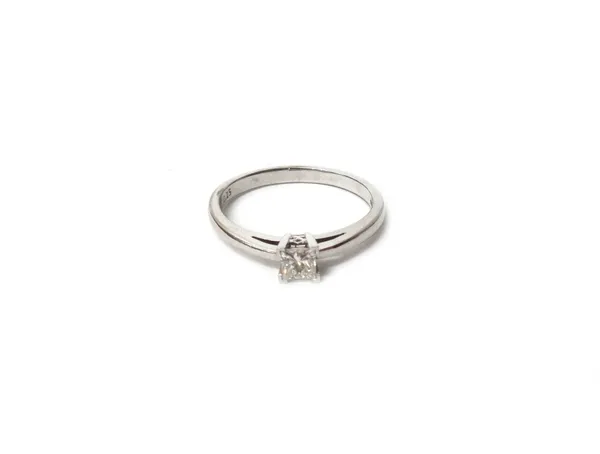 An 18ct white gold and diamond single stone ring, claw set with a princess cut diamond, detailed 0.25, ring size P, gross weight 3.3 gms.