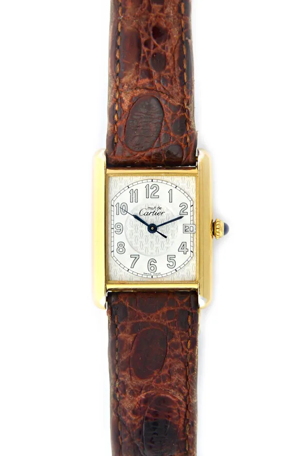 A Must de Cartier silver gilt rectangular cased lady's quartz wristwatch, the signed dial with Arabic numerals, date of the month aperture, centre sec