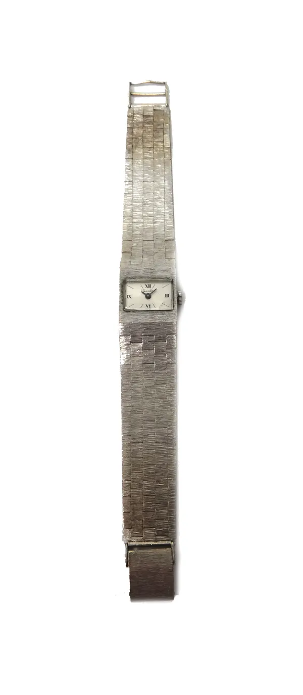 A Chevalier 9ct white gold rectangular cased lady's bracelet wristwatch, the signed rectangular dial with black Roman and baton numerals, on a 9ct gol