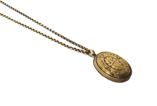 A Victorian gold back and front oval pendant locket, with engraved decoration, on a circular link neckchain with a cylindrical clasp, (2).