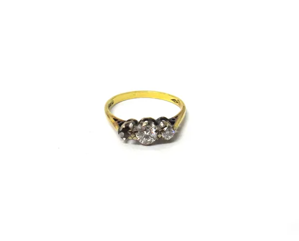 An 18ct gold ring, mounted with two circular cut diamonds (the third diamond lacking) ring size L and a half.