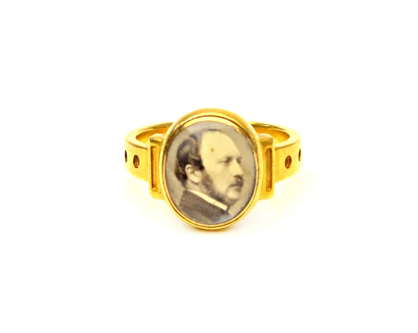 A gold ring, set with a black and white photograph of Prince Albert, The Prince Consort (1819-1861), ring size K and a half, gross weight 5.2 gms.  Il