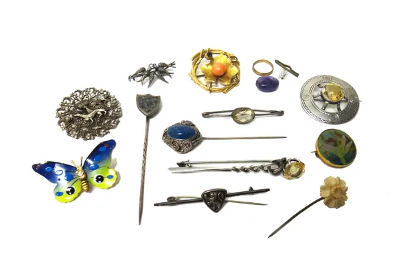 An enamelled circular brooch, with a dragonfly motif, a citrine set single stone circular brooch, detailed Robb Ballater, seven further brooches and p