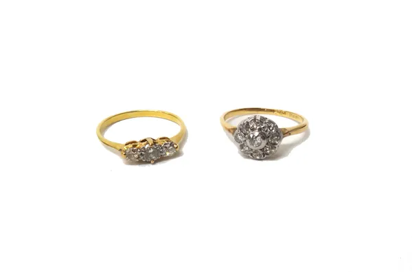 A gold and diamond set nine stone cluster ring, mounted with cushion shaped diamonds, ring size J and a gold and diamond set three stone ring, claw se