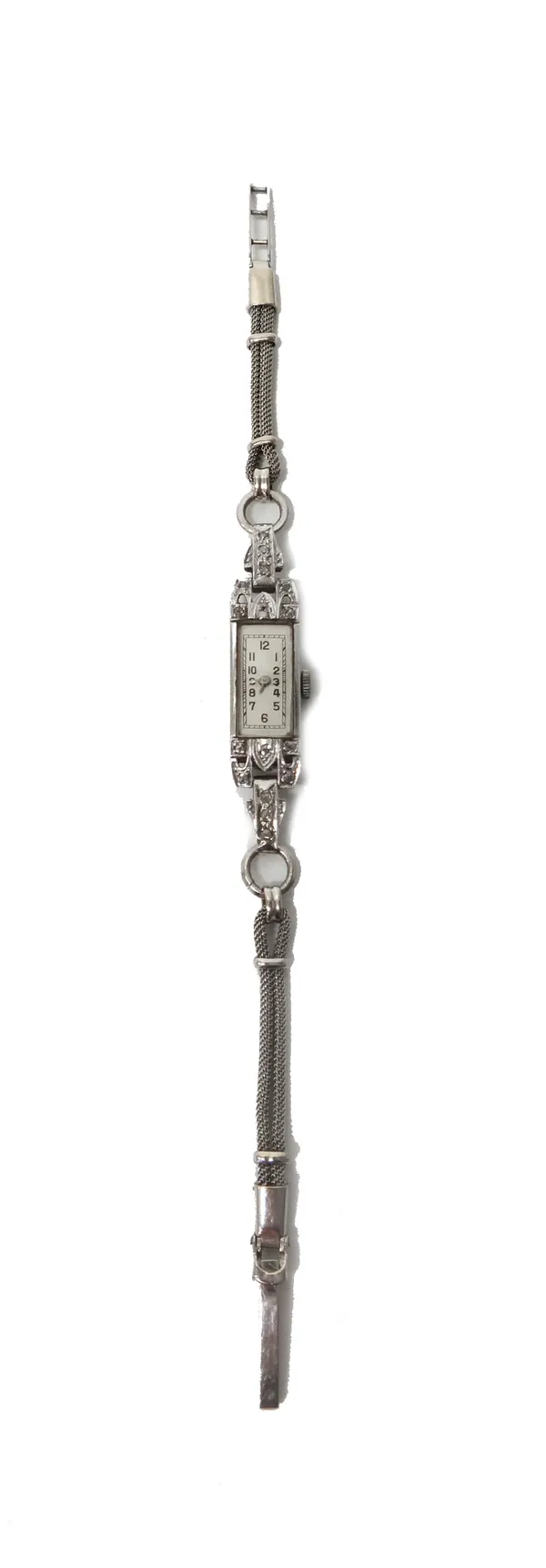 A lady's platinum cased and diamond set rectangular cased dress wristwatch, with a Swiss jewelled lever movement, the rectangular silvered dial with b