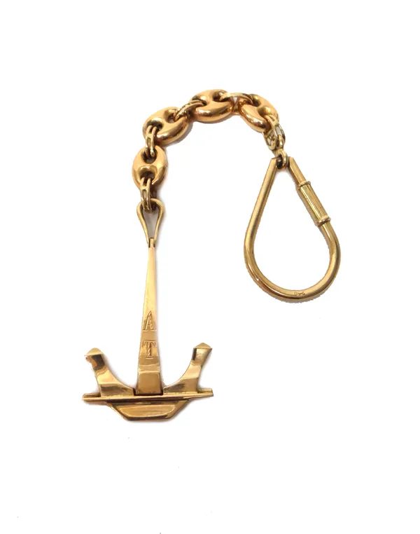 A gold keyring, the terminal formed as an anchor, fitted to an anchor link chain, the top detailed '750' , weight 15.4 gms.