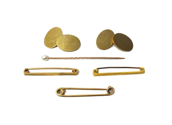 A pair of 9ct gold oval cufflinks, with plain backs and fronts, Birmingham 1958, weight 12.4 gms, three 9ct gold brooches and pins and a pearl topped