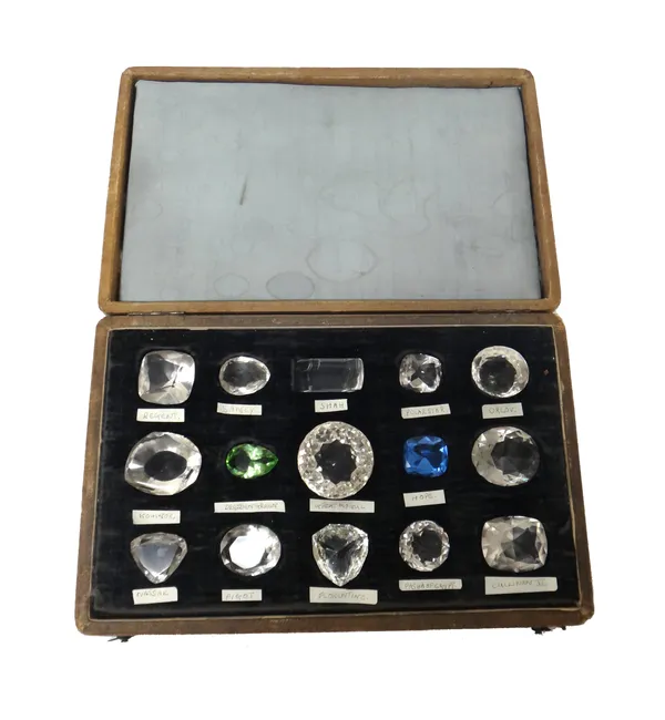 A display of paste imitations of fifteen famous diamonds, including Kohinor, Regent, Great Mogul and Florentine, with paper labels, in a display box.