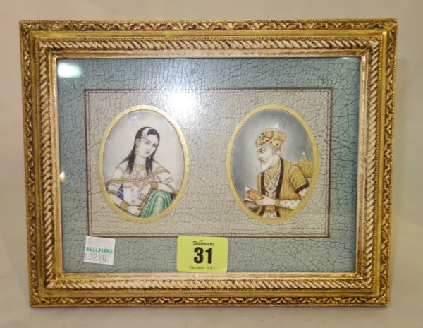 A pair of Persian oval miniature portraits of a man and woman, each 6.5cm x 5cm, in common frame.CAB