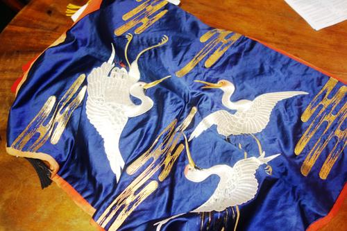 Five Japanese fukasas (wrapping cloths), 19th century, including a kesi weave example depicting a cockerel perched on a drum, 69cm x 61cm, another of