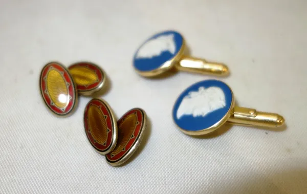 A pair of silver gilt and enamel cufflinks and a pair of Wedgwood gilt metal cufflinks, (2).  CAB